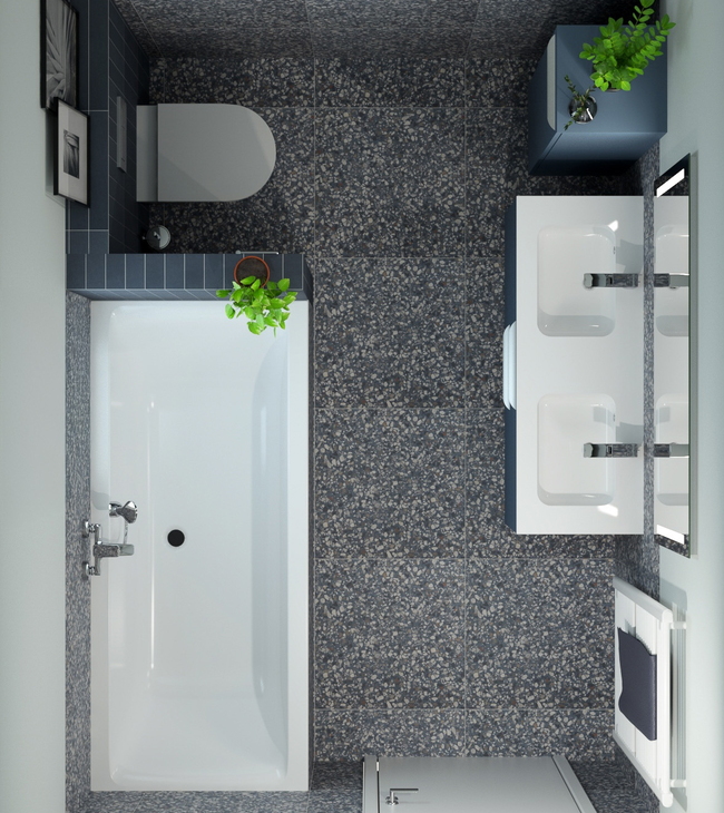 Bovenaanzicht van een kleine badkamer met ligbad, dubbele wastafel en hangtoilet, slim ingedeeld voor optimaal ruimtegebruik.
